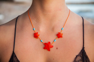 Three starfish beach glass necklace