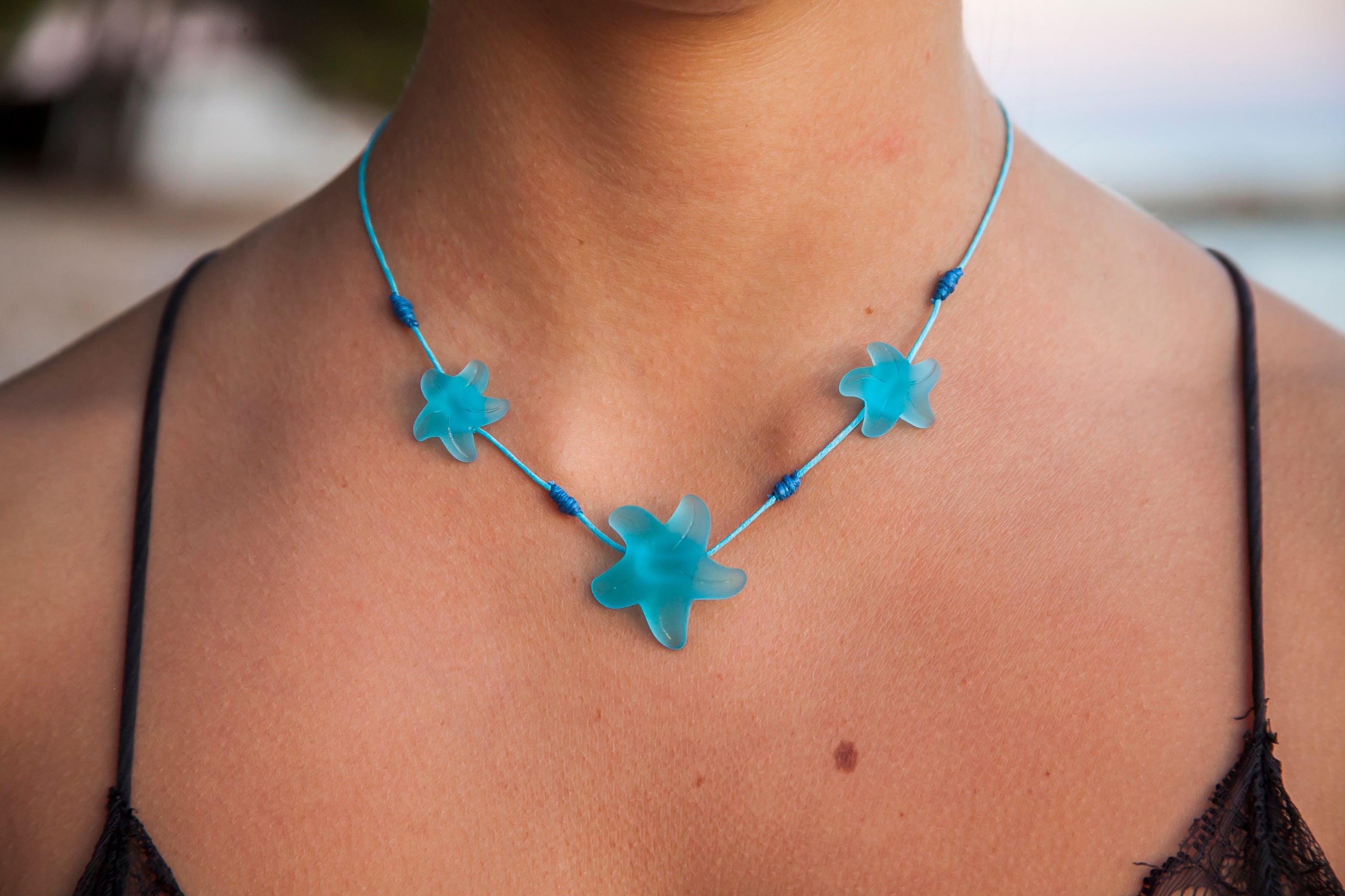 Three starfish beach glass necklace